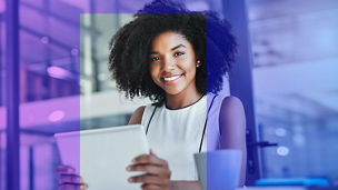Lady smiling with tablet computer